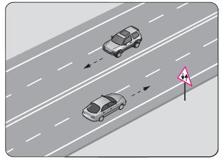 Soru 32 görseli: Şekildeki yol bölümünde görülen trafik işaret levhası, sürücüye aşağıdakilerden hangisi…